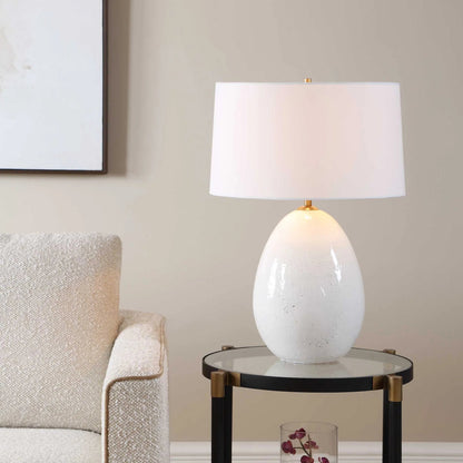 Avery Glaze Table Lamp by Uttermost in white and brass. Made from ceramic, fabric, iron in a unique style.