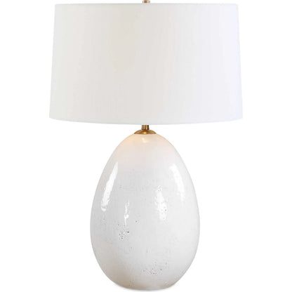Avery Glaze Table Lamp by Uttermost in white and brass. Made from ceramic, fabric, iron in a unique style.