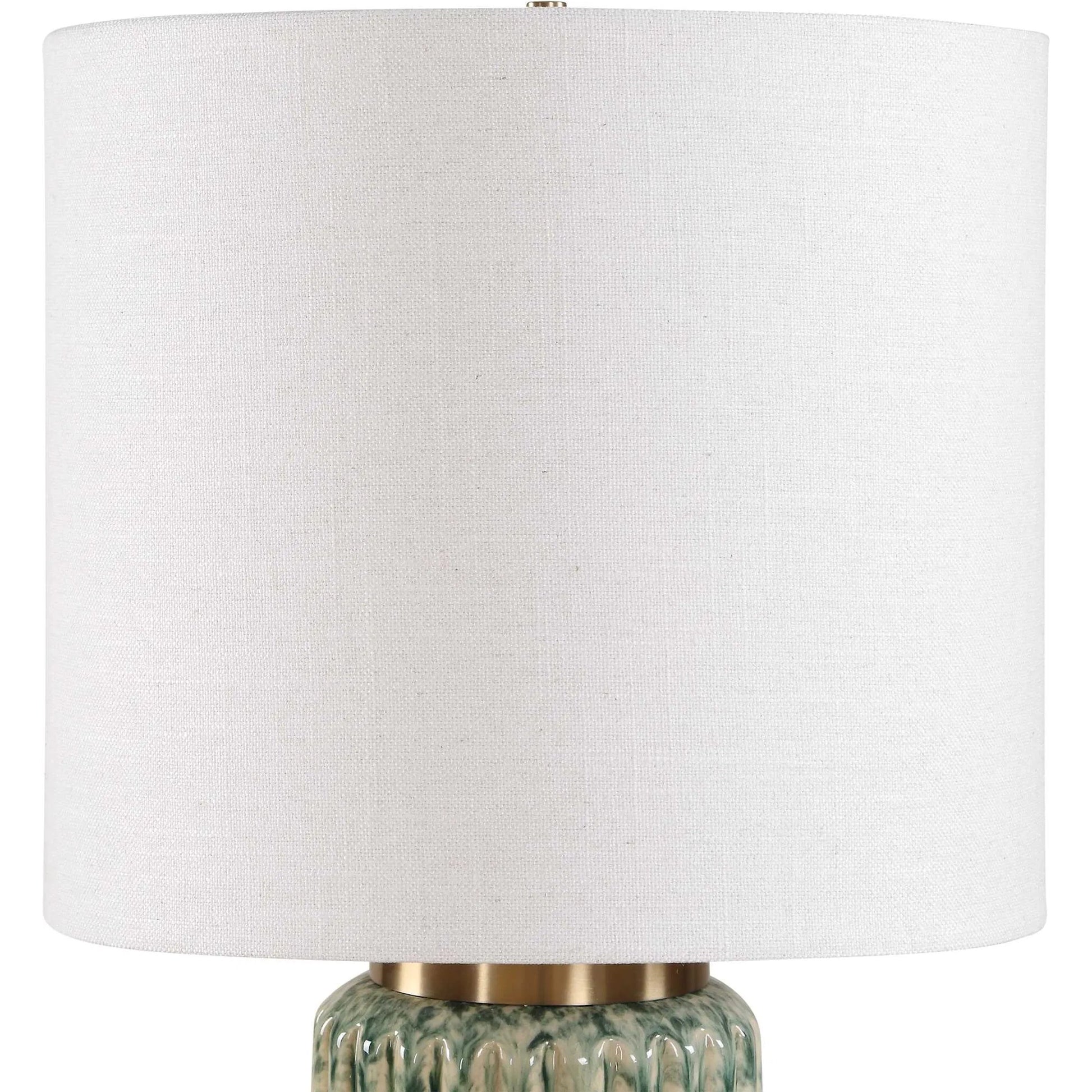 Hensley & Table Lamp by Uttermost in green, white and brass. Made from ceramic, fabric, iron in a unique style.