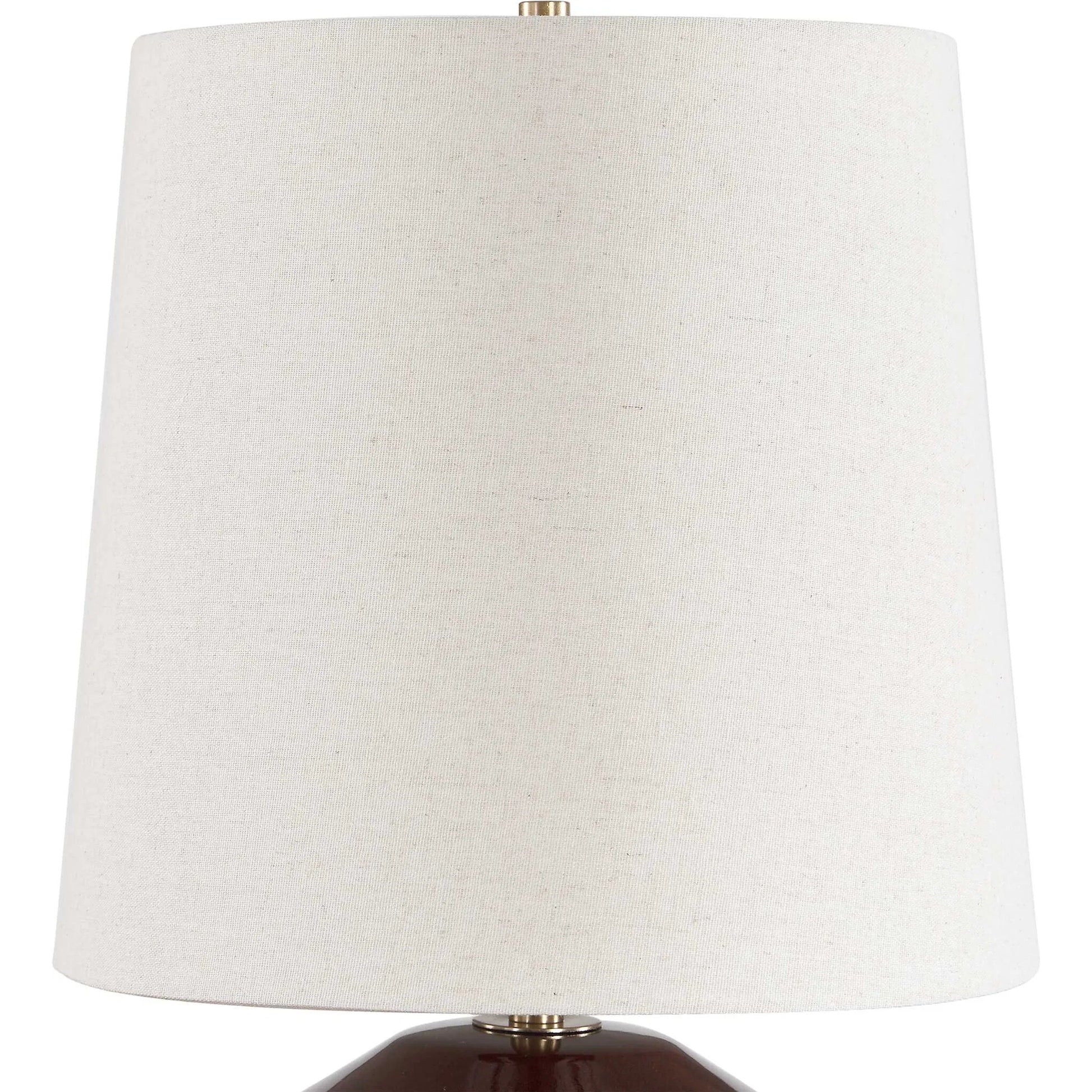 Allemand Table Lamp by Uttermost in red and dark. Made from ceramic, iron, fabric in a unique style.