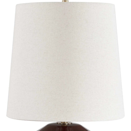 Allemand Table Lamp by Uttermost in red and dark. Made from ceramic, iron, fabric in a unique style.