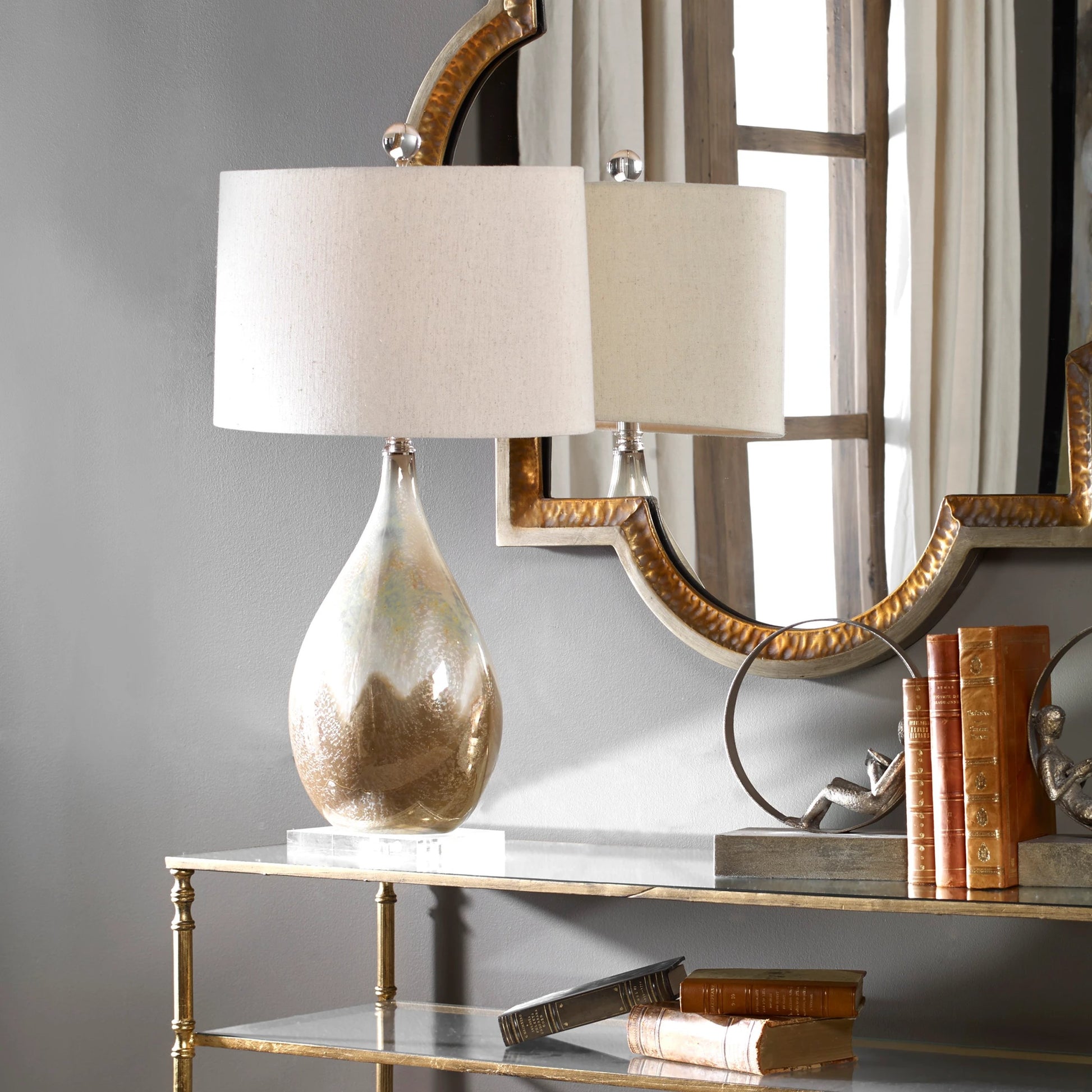 Flavian Glazed Ceramic Lamp by Uttermost. Made from crystal, ceramic in a modern style.