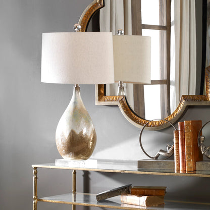 Flavian Glazed Ceramic Lamp by Uttermost. Made from crystal, ceramic in a modern style.