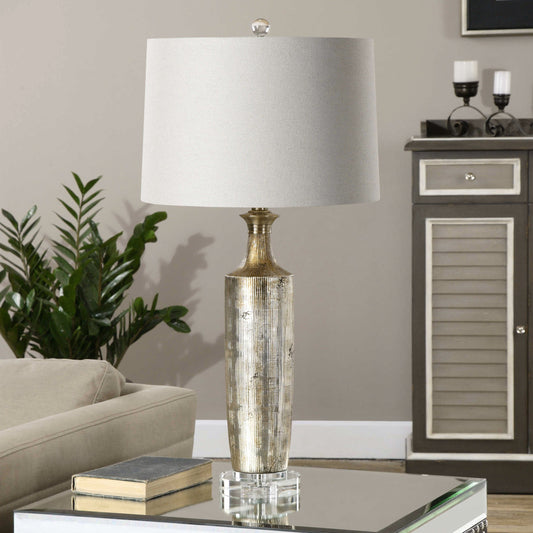 Valdieri Lamp by Uttermost in bronze. Made from crystal, metal, ceramic, fabric in a modern style.