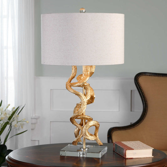 Twisted Vines Table Lamp by Uttermost in gold. Made from crystal, steel, polyester in a modern style.