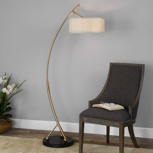 Vardar Curved Brass Floor Lamp by Uttermost. Made from iron in a modern style.