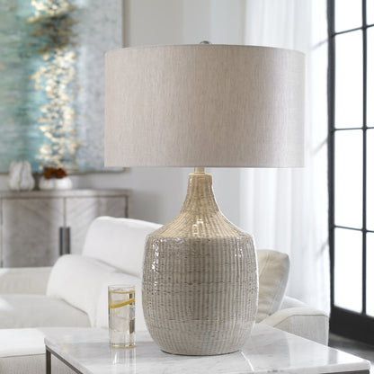 Felipe Table Lamp by Uttermost in light gray. Made from ceramic, iron, fabric in a eclectic & global style.