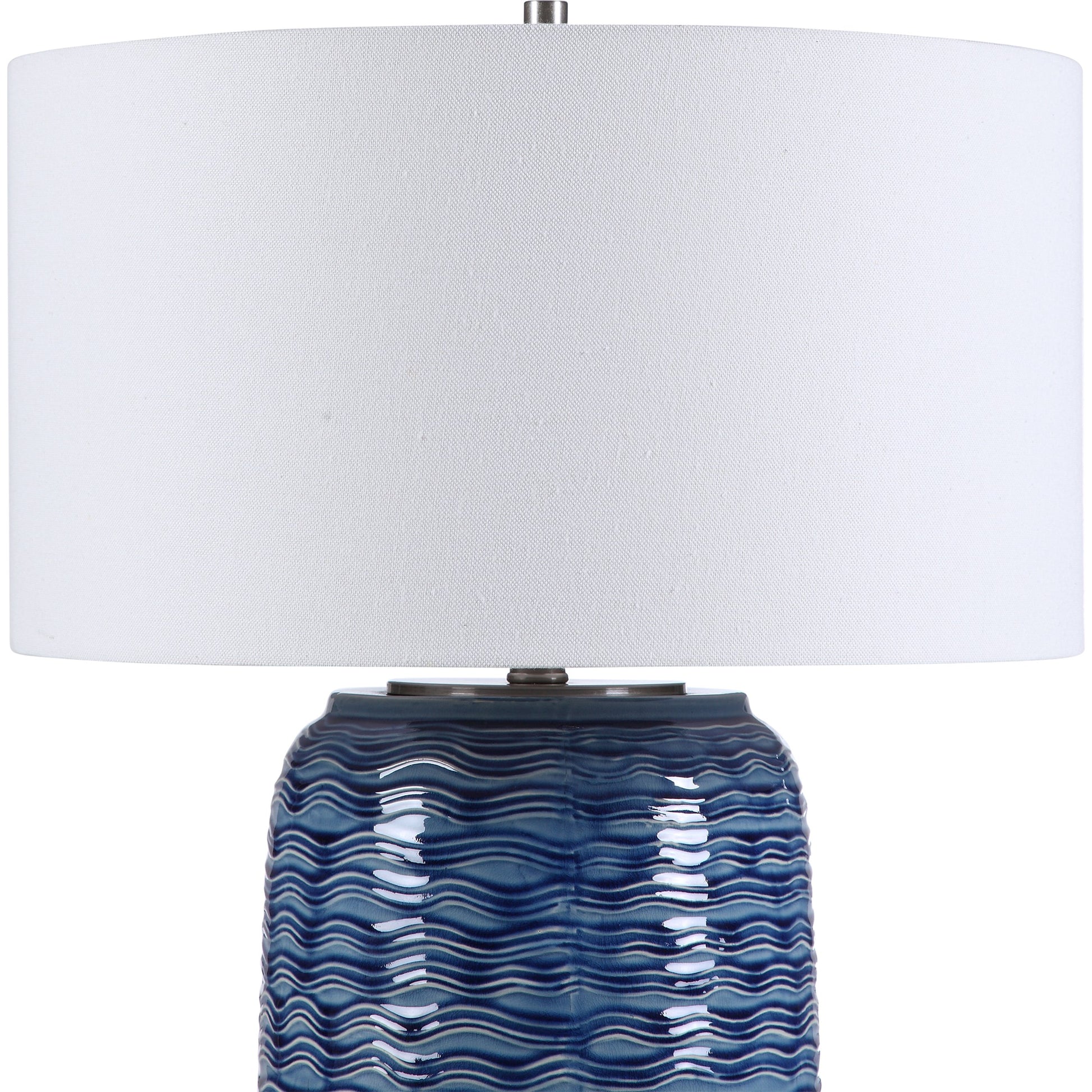 Sedna Table Lamp by Uttermost in blue. Made from medium temperature ceramic, iron in a coastal style.