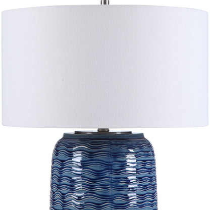 Sedna Table Lamp by Uttermost in blue. Made from medium temperature ceramic, iron in a coastal style.