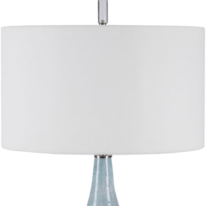 Rialta Coastal Table Lamp by Uttermost. Made from steel, ceramic, crystal in a coastal style.