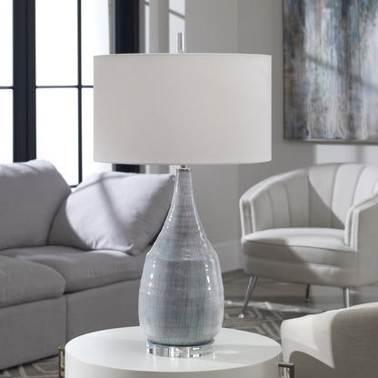 Rialta Coastal Table Lamp by Uttermost. Made from steel, ceramic, crystal in a coastal style.