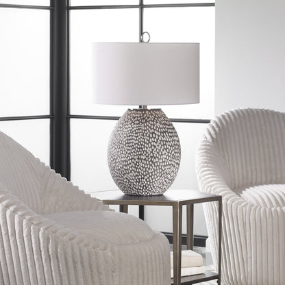 Cyprien Table Lamp by Uttermost in gray. Made from iron, ceramic, fabric in a modern style.
