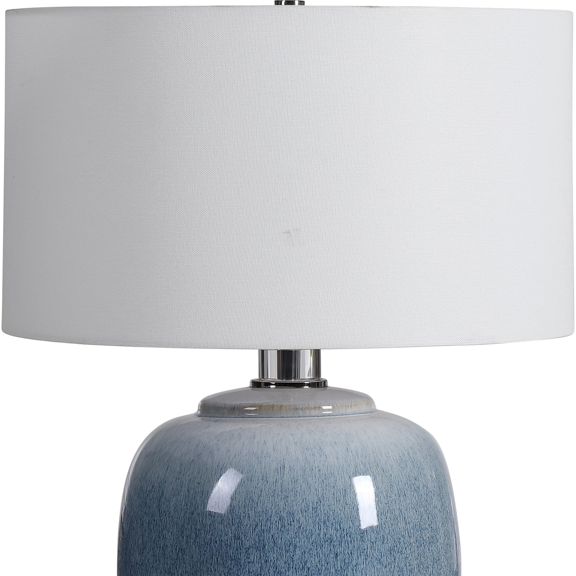 Waters Table Lamp by Uttermost in blue. Made from steel, ceramic, crystal, fabric in a coastal style.