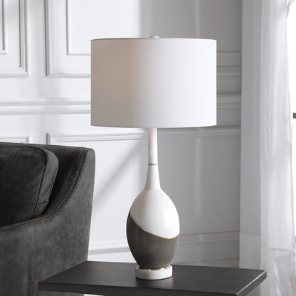 Tanali Table Lamp by Uttermost. Made from copper, concrete, resin, iron, fabric in a modern style.