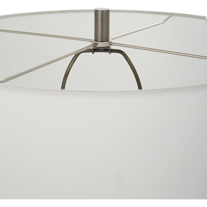 Keiron Table Lamp by Uttermost in brass. Made from steel, cast iron, fabric in a modern style.