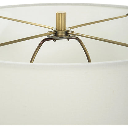 Crystal Column Table Lamp by Uttermost in brass. Made from crystal, iron, fabric in a modern style.