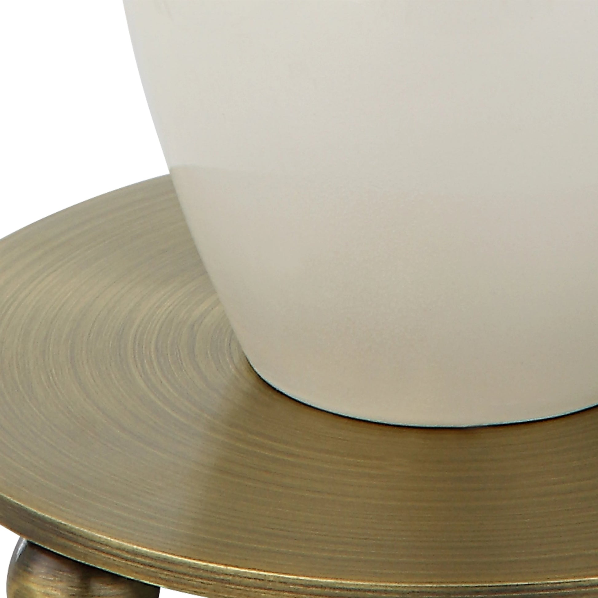 Annora Glossy Table Lamp by Uttermost in brass. Made from steel, resin, fabric in a modern style.