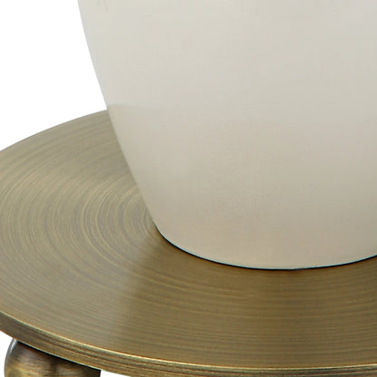 Annora Glossy Table Lamp by Uttermost in brass. Made from steel, resin, fabric in a modern style.
