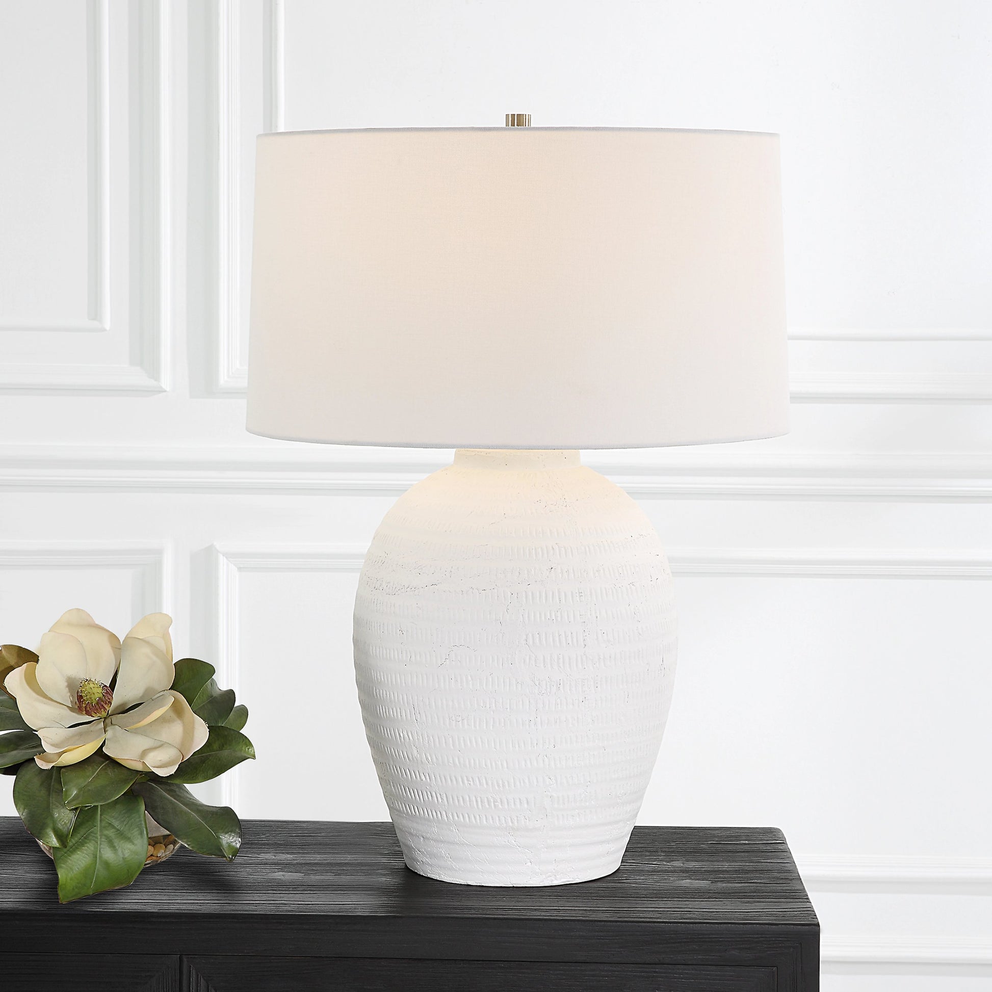Reyna Table Lamp by Uttermost in chalk white, nickel. Made from steel, ceramic, fabric in a modern style.