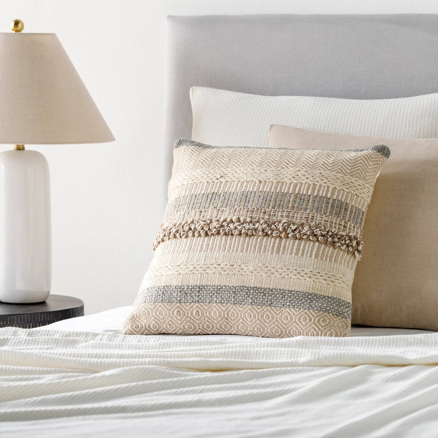 003 S-348317,S-348318 | Lifestyle | Lorens Pillow - 36762 by Livabliss in cream, medium gray, white, ivory, camel. Made from 53% wool, 28% viscose, 10% jute, 9% cotton, 100% cotton in a modern style.