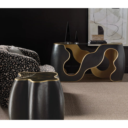 Melange Even and Flow Round End Table by Hooker Furniture in black, gold accents. Made from resin, glass in a modern style.