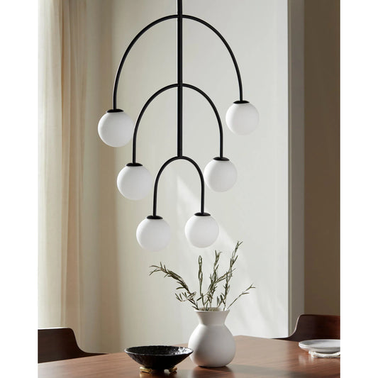 Laon Chandelier by Surya in black, white. Made from iron, glass in a unique style.