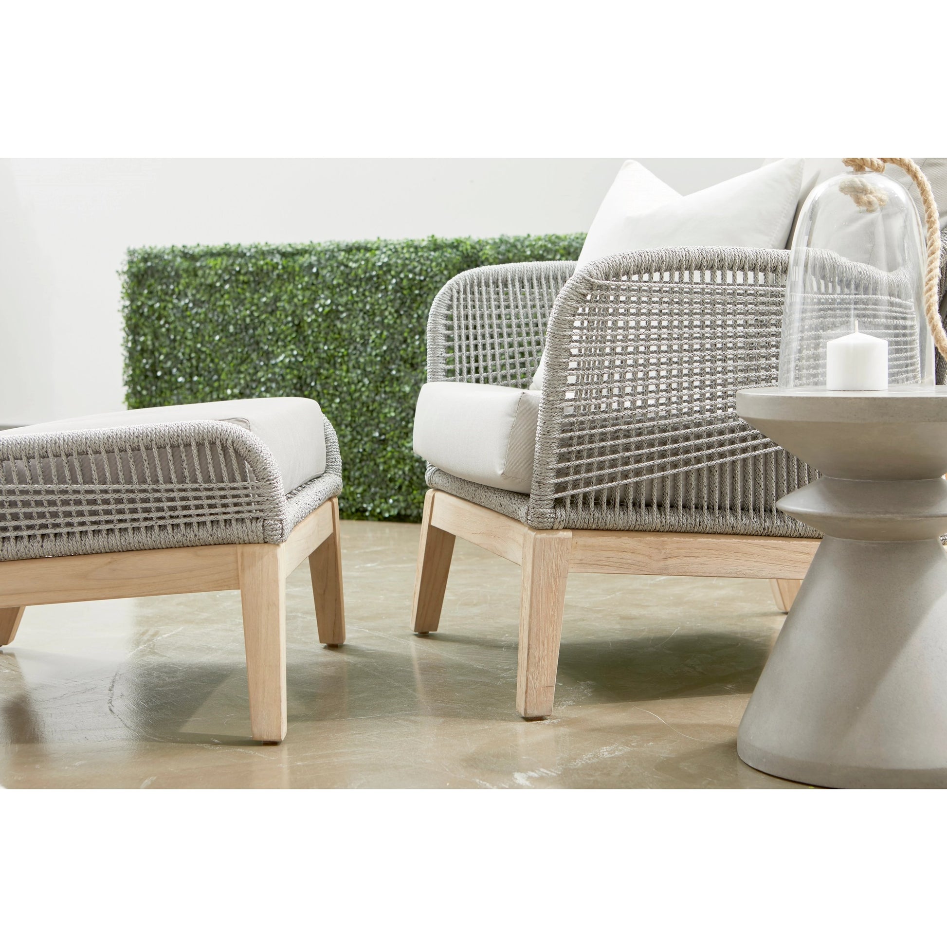 Loom Footstool by Essentials For Living in gray teak, taupe, white flat rope, performance pumice. Made from solid teak wood, aluminum, 100% polyolefin rope, 100% olefin fabric, foam in a coastal style.