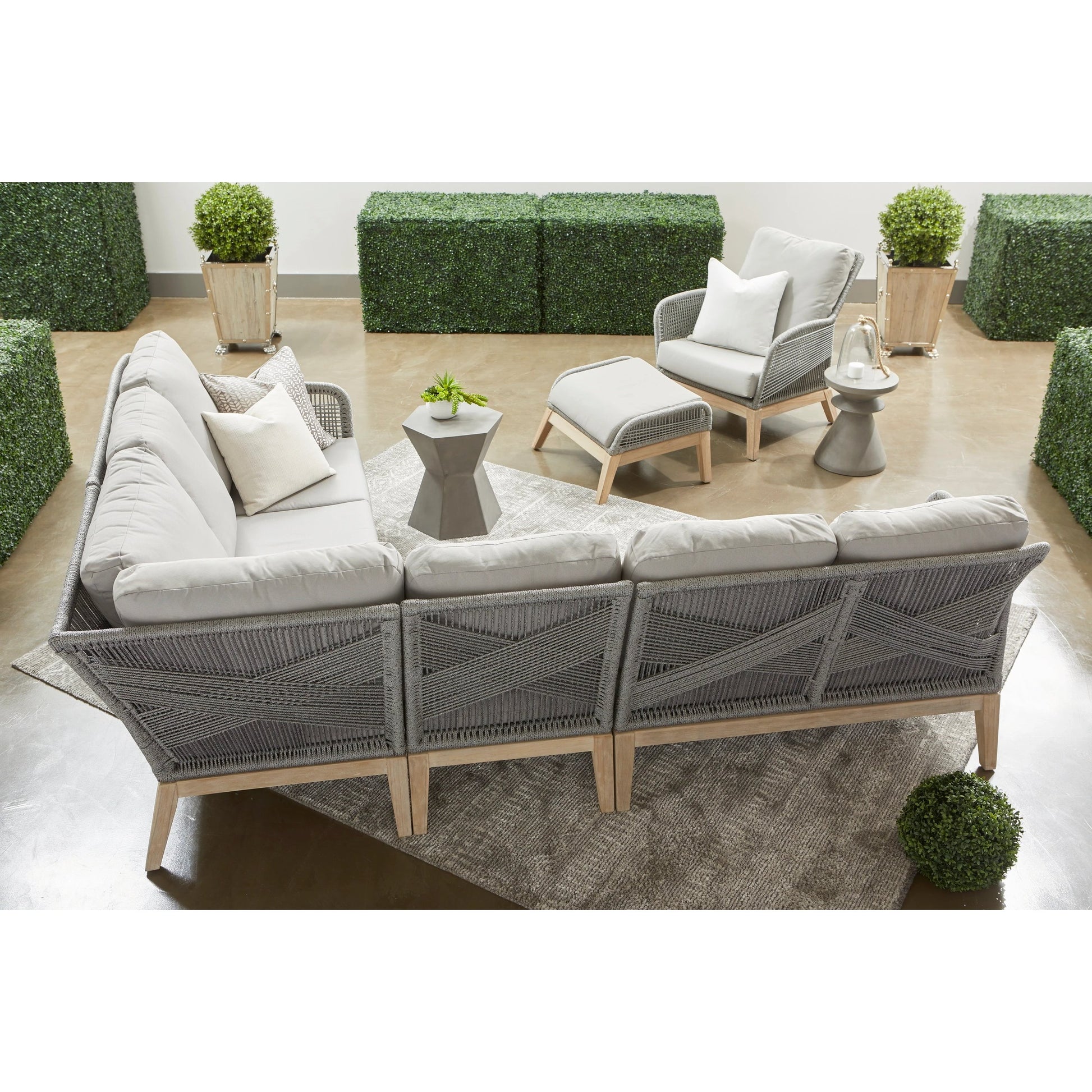Loom Club Chair by Essentials For Living in gray teak, taupe, white flat rope, performance pumice. Made from solid teak wood, aluminum, 100% polyolefin rope, 100% olefin fabric, foam in a coastal style.