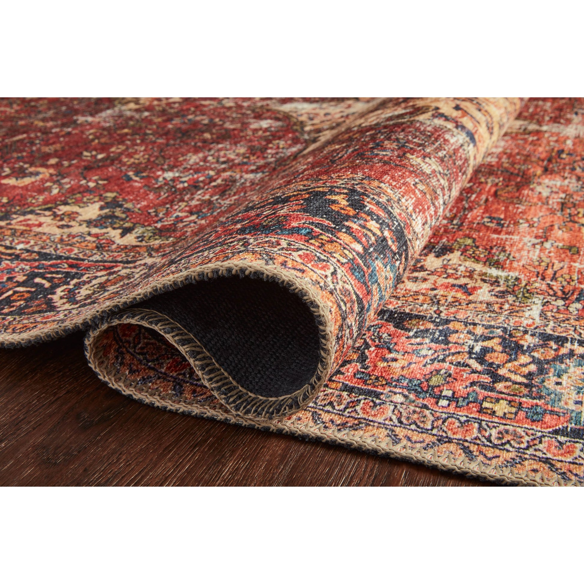 Loren LQ-07 Rug by Loloi in red, navy. Made from 100% polyester in a rustic style.