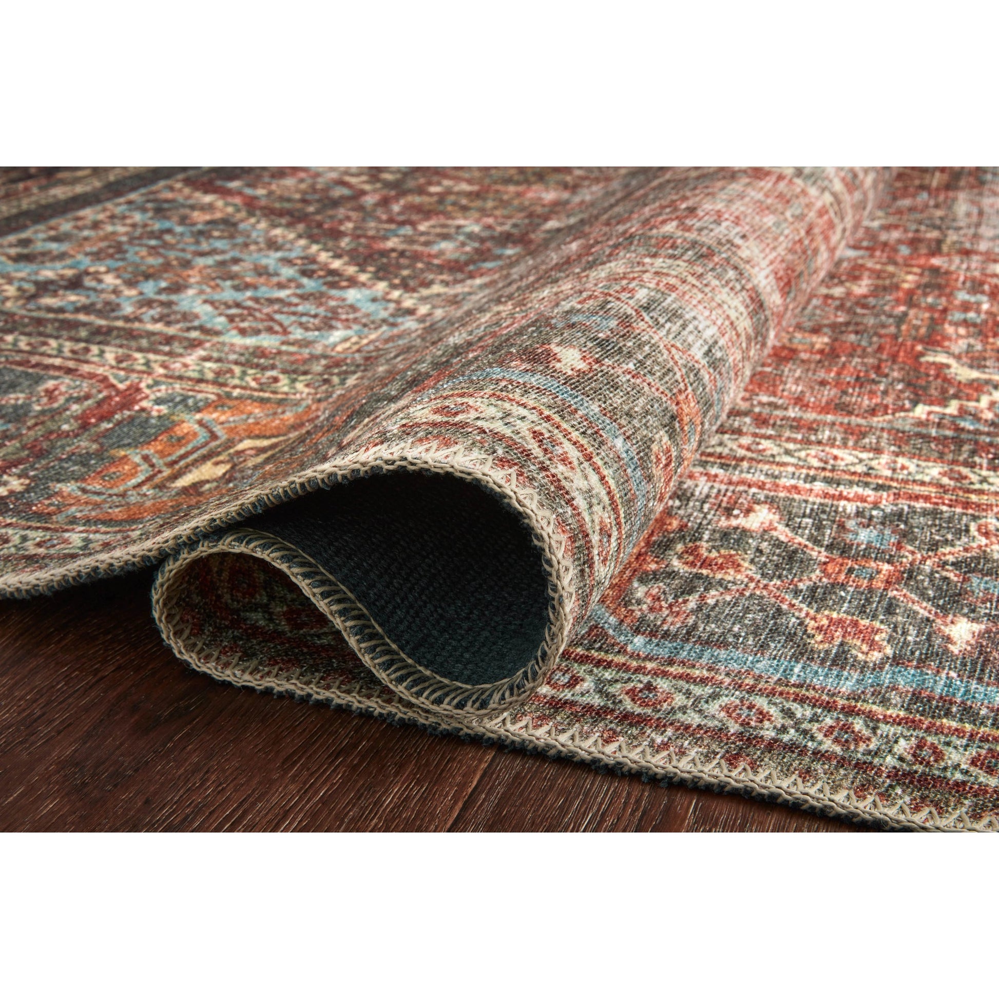 Loren LQ-13 Rug by Loloi in brick, midnight. Made from 100% polyester in a traditional style.