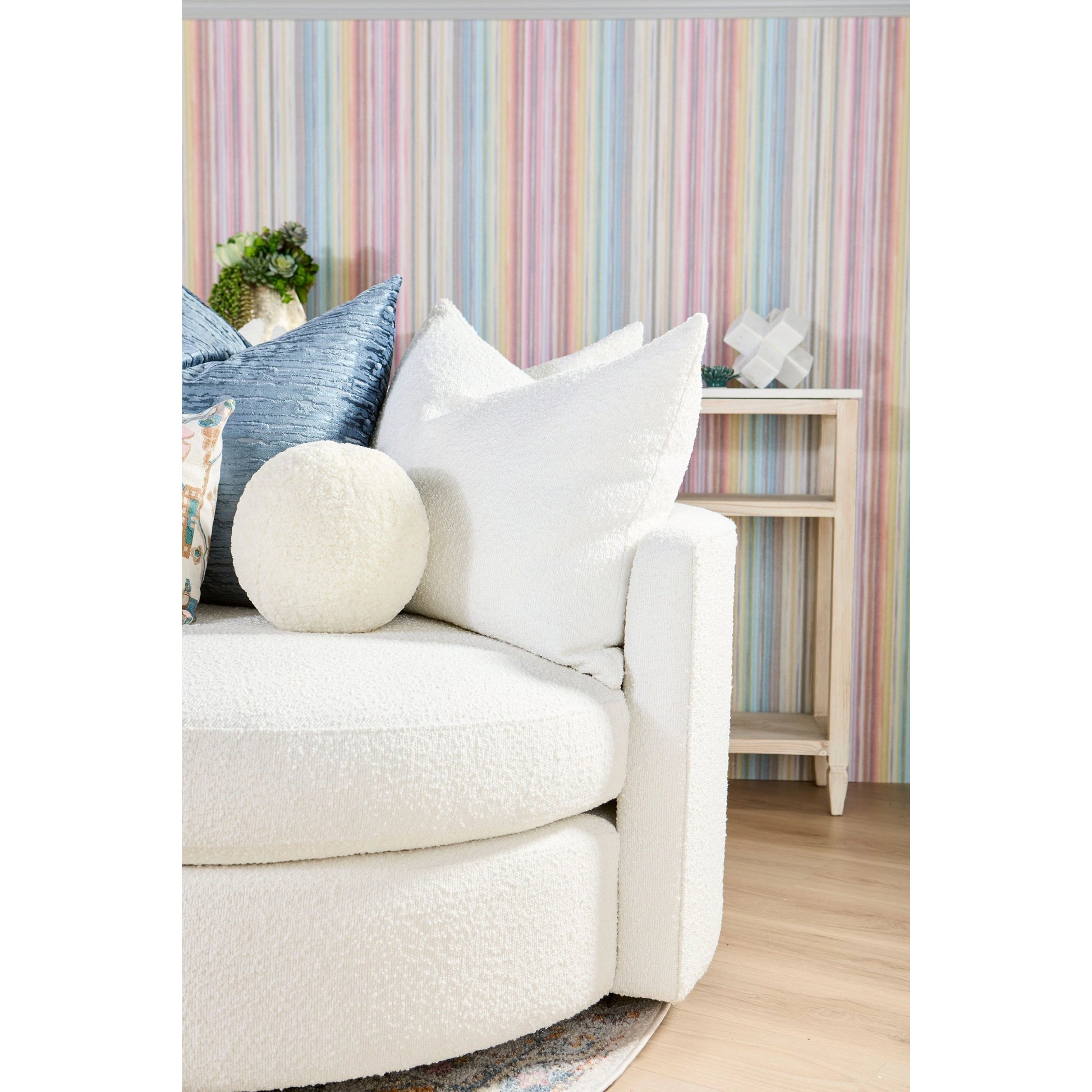 Lourne Grand Swivel Sofa Chair by Essentials For Living in performance boucle snow. Made from mdf, plywood, metal, 96% polyester/4% acrylic fabric, foam, down blend, down feather in a modern style.