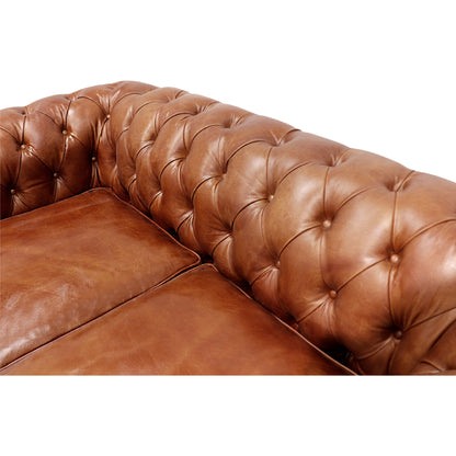 Chester Bay Loveseat by Pasargad Home in brown. Made from leather in a traditional style.