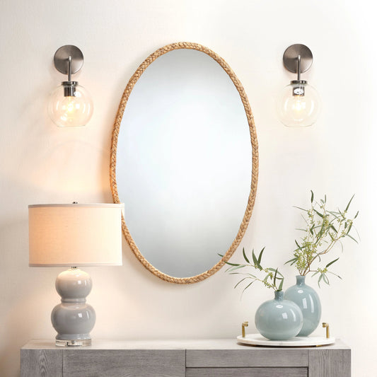Sparrow Braided Oval Mirror by The Livingston Collection in natural seagrass. Made from seagrass in a eclectic & global style.