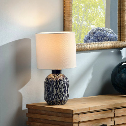 Highland Table Lamp by The Livingston Collection in blue and patterned blue, white. Made from ceramic in a unique style.