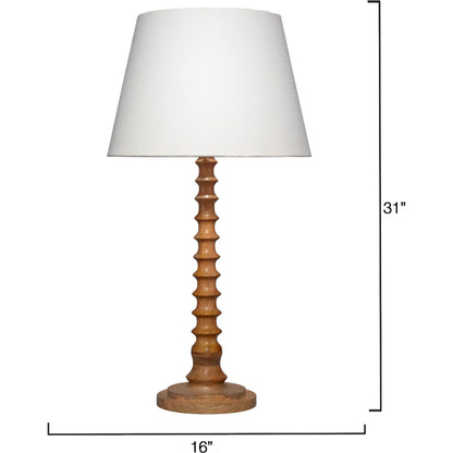 Revolution Table Lamp by Jamie Young. Made from mango wood in a traditional style.
