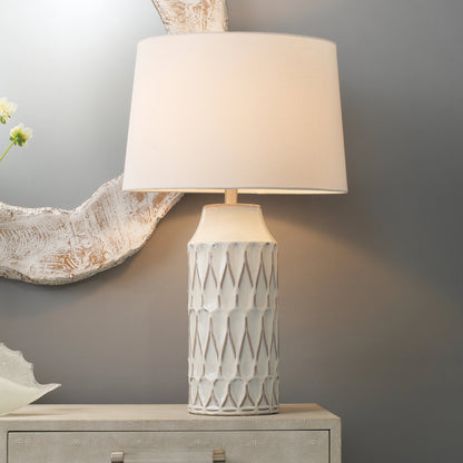 Dalia Table Lamp by The Livingston Collection in white patterned ceramic. Made from ceramic, linen in a coastal style.