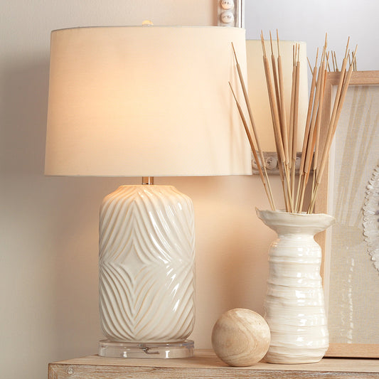 Harper Table Lamp by The Livingston Collection in white with natural undertone. Made from white with natural undertone in a transitional style.