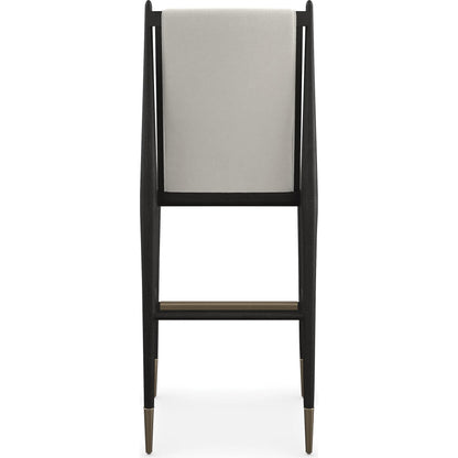 Unity Light Bar Stool by Caracole. Made from oak in a unique style.