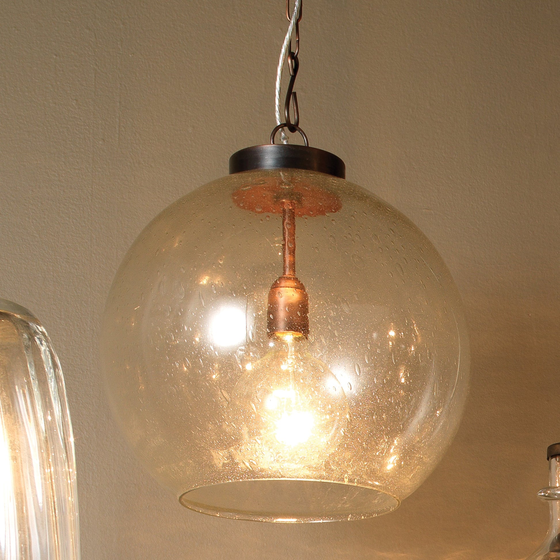 Luca Pendant by Lifestyle by JY in antique brass, seeded glass. Made from glass, metal in a modern style.
