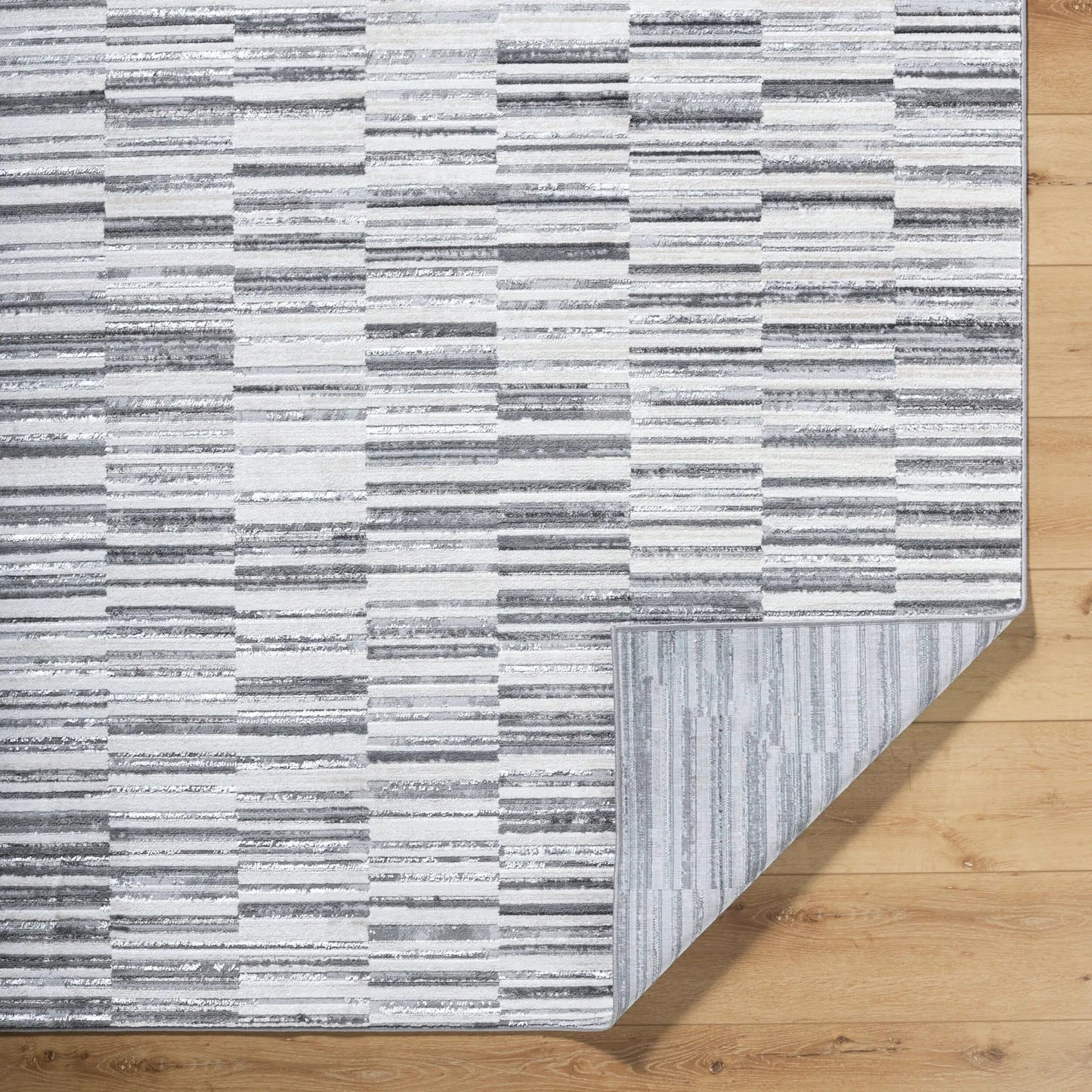 002 SI-2349409,SI-2349410 | Closeup | Lustro LSR-2331 Rug by Livabliss in ivory, light beige, gray, charcoal, black. Made from polypropylene, polyester in a unique style.
