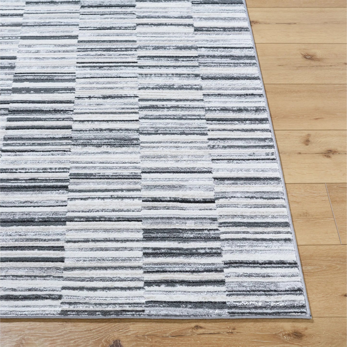 003 SI-2349409,SI-2349410 | Closeup | Lustro LSR-2331 Rug by Livabliss in ivory, light beige, gray, charcoal, black. Made from polypropylene, polyester in a unique style.