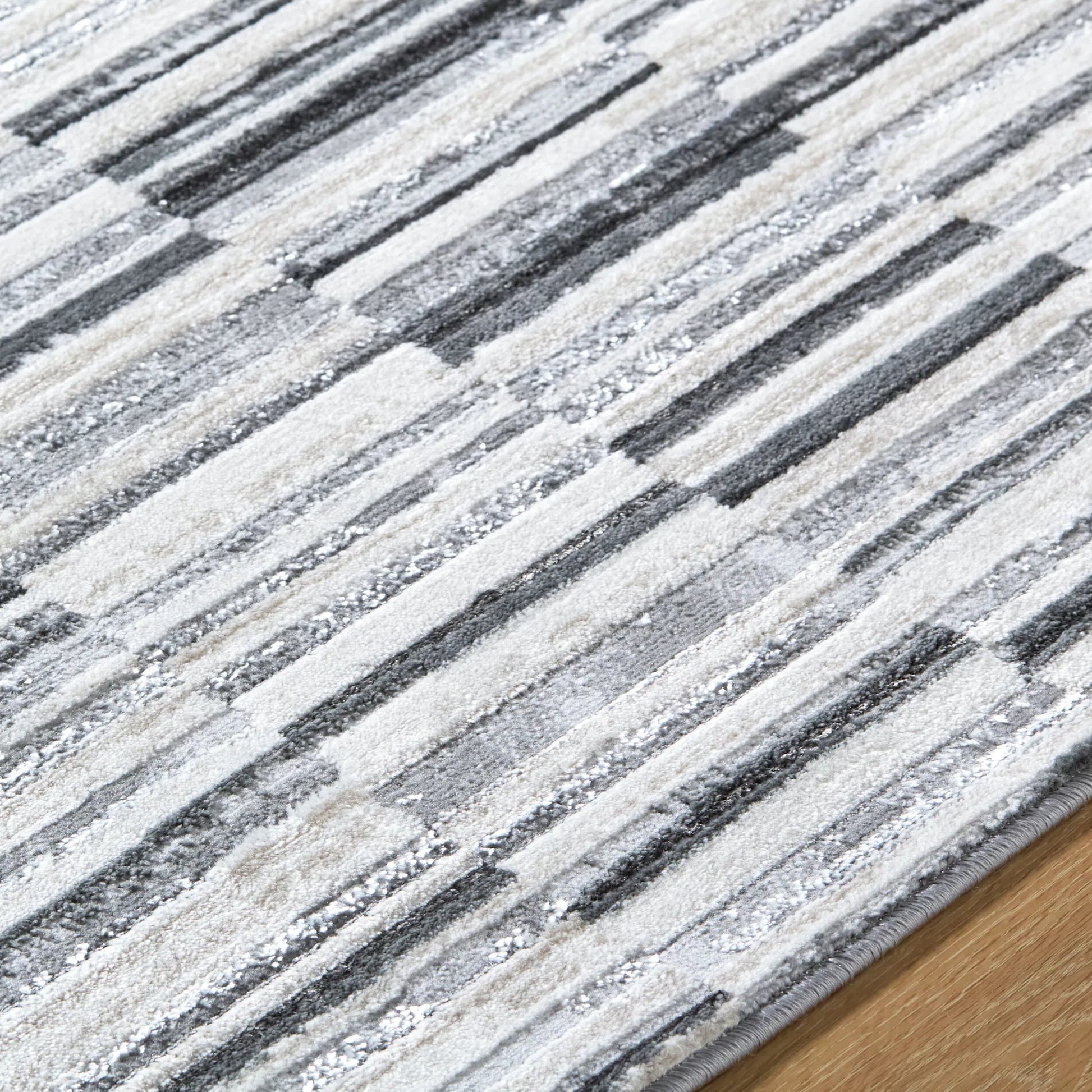 Lustro LSR-2331 Rug by Livabliss in ivory, light beige, gray, charcoal, black. Made from polypropylene, polyester in a unique style.