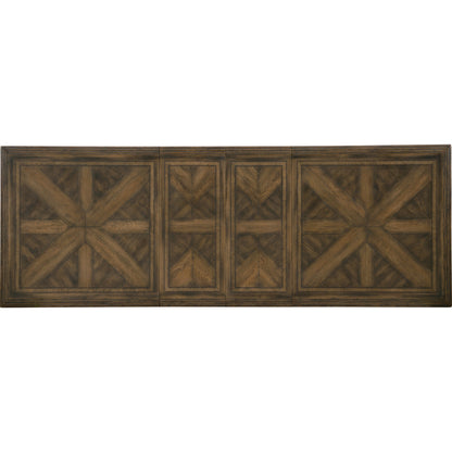 Bandera Dining Table by Hooker Furniture in saddle brown, anthracite black. Made from white oak, walnut veneers with resin in a traditional style.