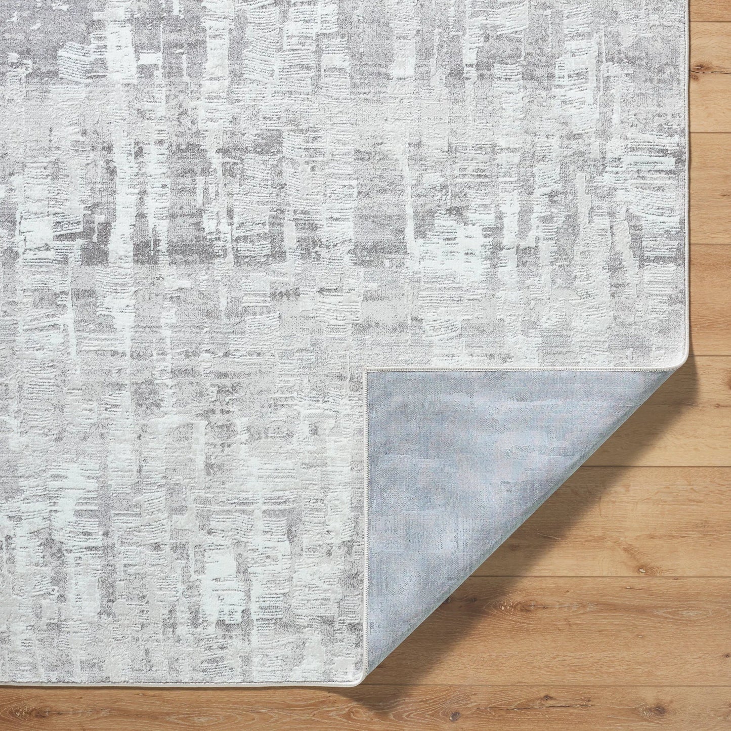 004 SI-2246000,SI-2246001,SI-2246002 | Closeup | Lorenz 557271 Rug by Livabliss in light sage, ivory, light gray, gray. Made from polypropylene, polyester in a unique style.