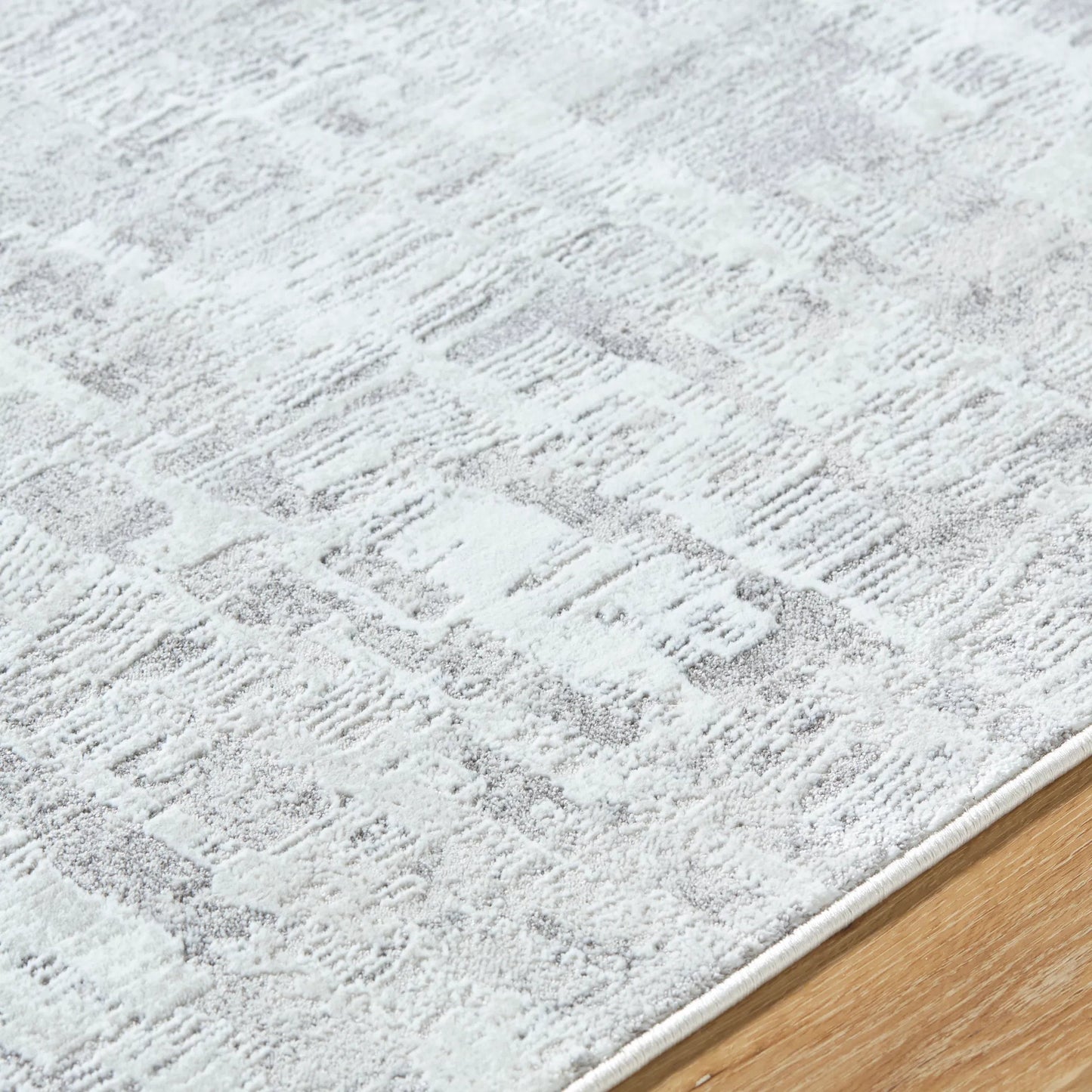 005 SI-2246000,SI-2246001,SI-2246002 | Closeup | Lorenz 557271 Rug by Livabliss in light sage, ivory, light gray, gray. Made from polypropylene, polyester in a unique style.