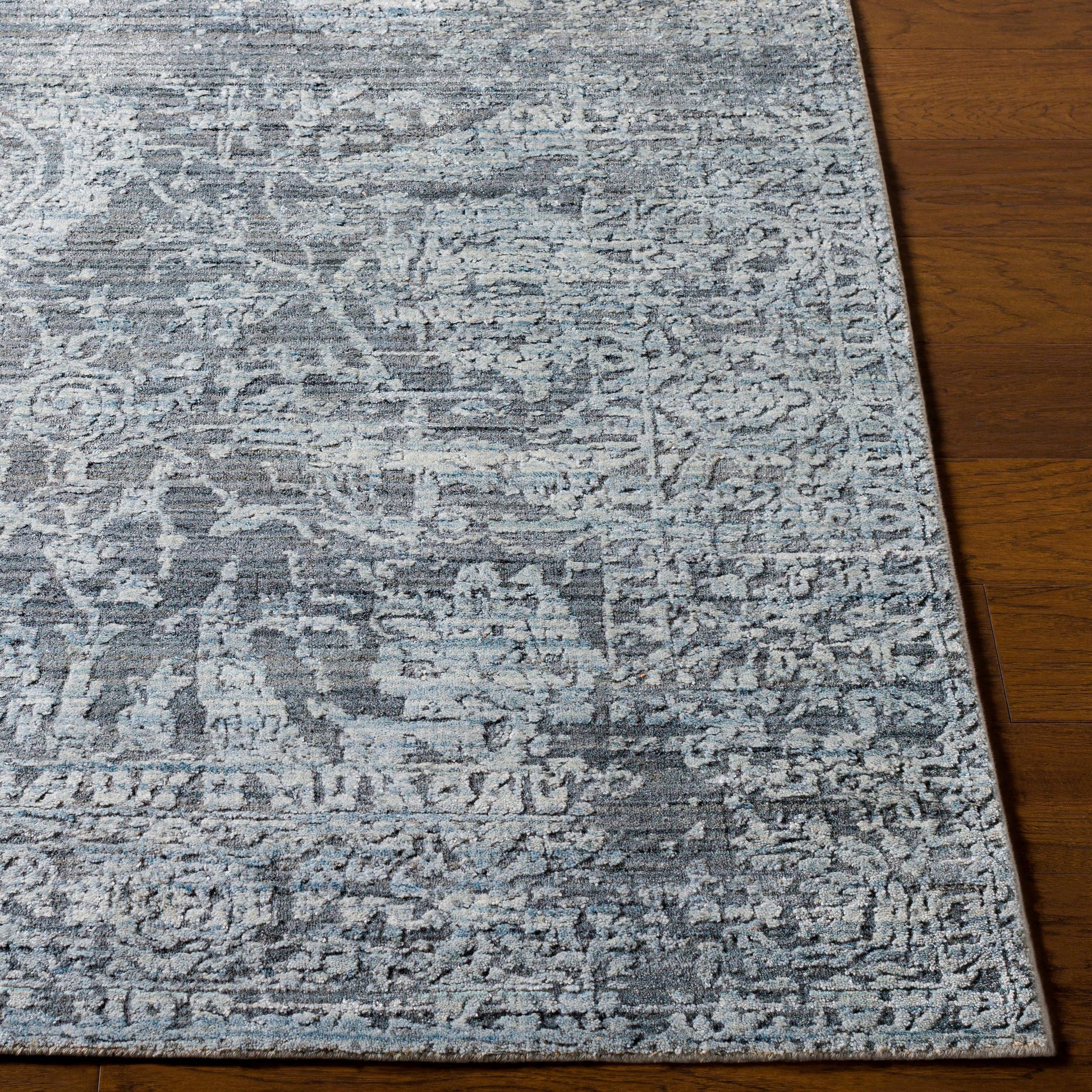 Lucknow Rug - 25225 by Surya in charcoal, light slate, black. Made from 75% viscose, 25% wool in a unique style.