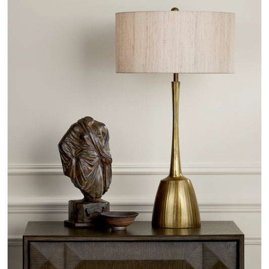 Cheenee Table Lamp by Currey and Company in antique brass. Made from cast aluminum in a modern style.
