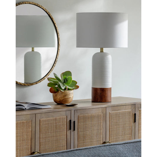 Livia Table Lamp - 531735 by Livabliss in body: white, shade: white, finial: brown, harp: metallic - brass, cord: translucent and coloredcolored. Made from resin, linen, polyester, iron in a modern style.