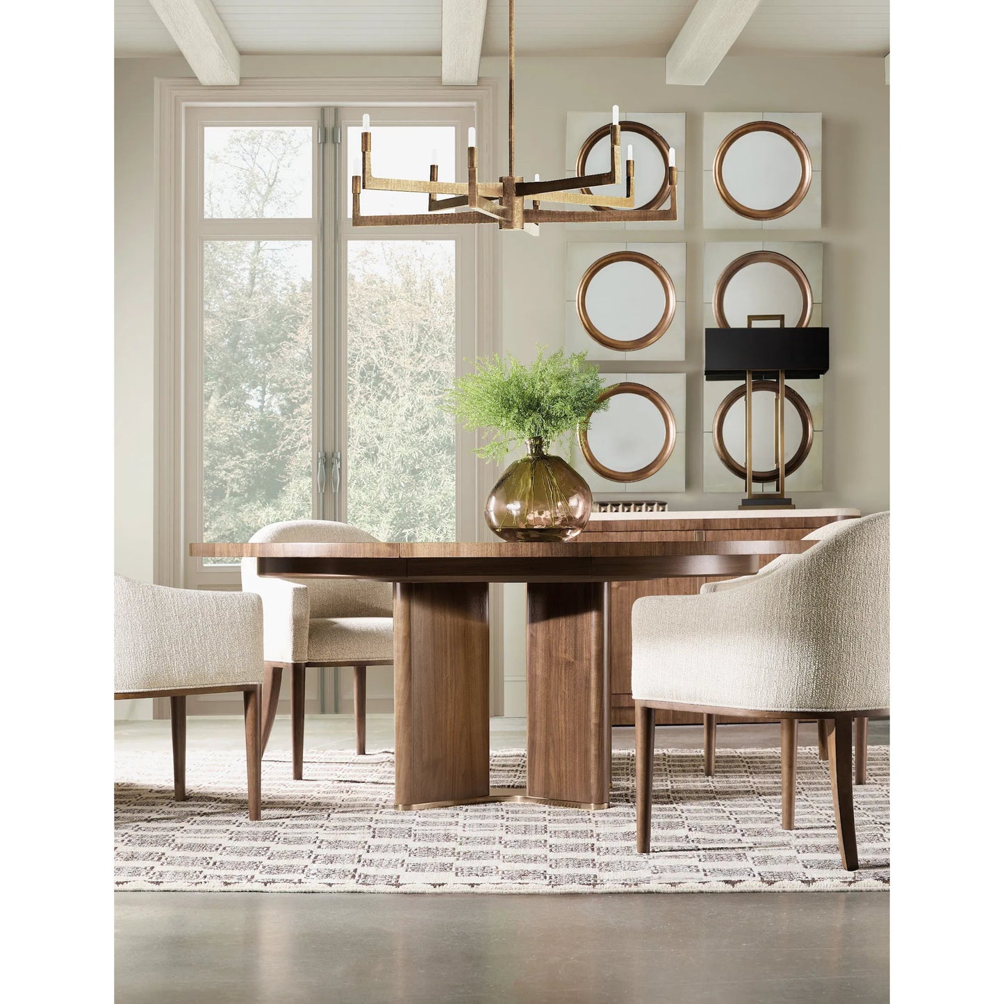 006 SI-2458562 | Lifestyle | Eleana Round Dining Table with One 20-inch Leaf by Hooker Furniture in light caramel, sunlit bronze metal. Made from walnut veneers, metal in a modern style.