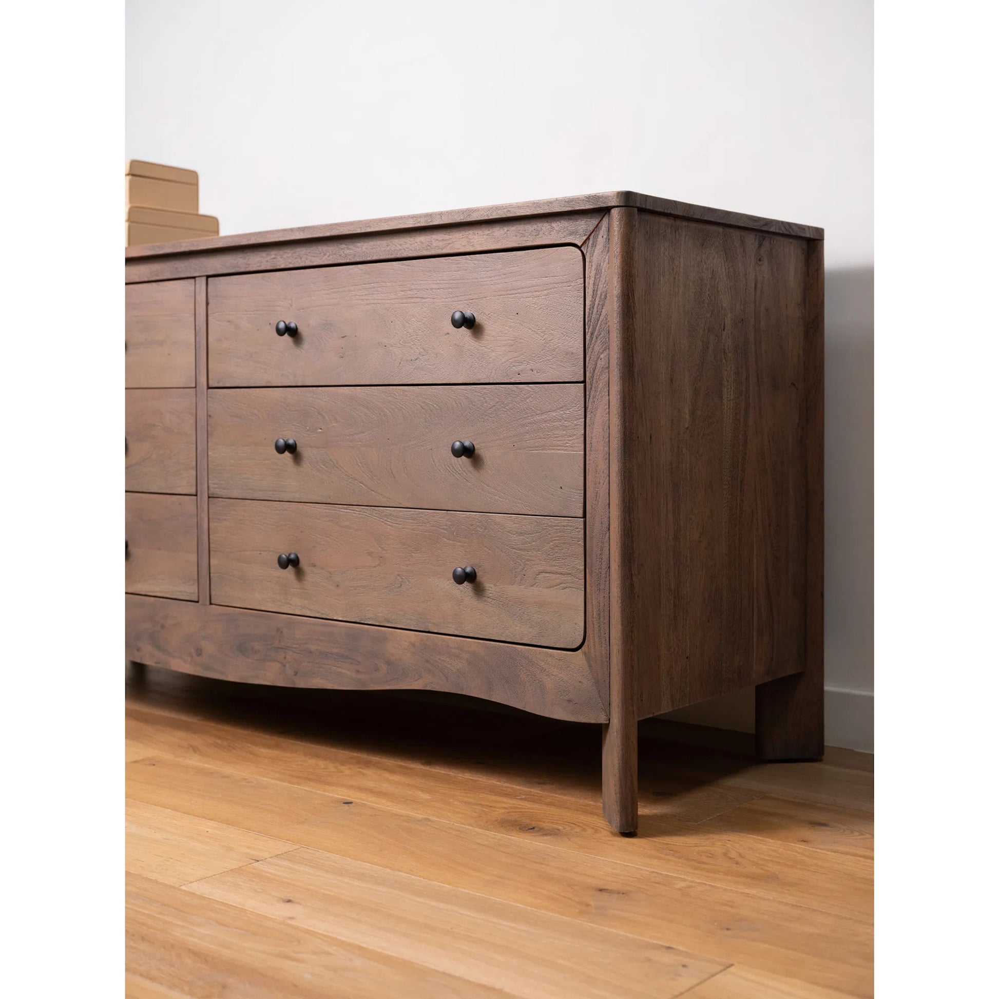 Mabel 6 Drawer Dresser by Moe's Home Collection in dark brown. Made from entire structure, drawer front, solid acacia wood, drawer acacia veneer over mdf in a unique style.